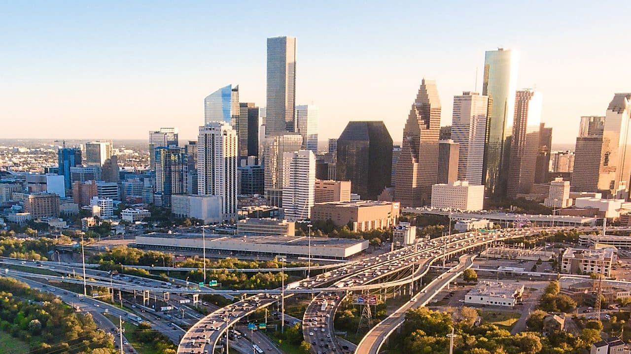 Busy highway with a city in the background
