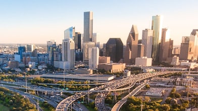Busy highway with a city in the background