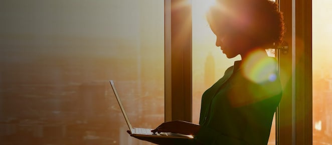 Woman holding a laptop