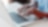 man typing on laptop