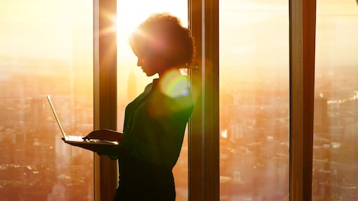 Woman holding a laptop