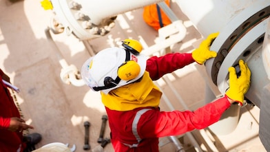 Worker wearing safety mask and gloves 