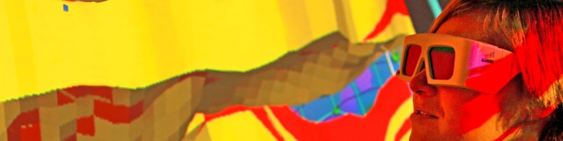 lady wtaching screen with 3d glasses