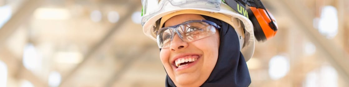 Lady in red dress at work place