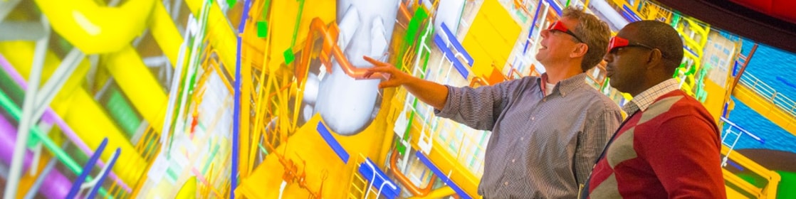 two man watching big screen with 3d glasses