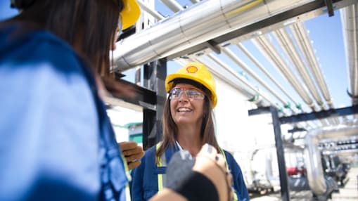 female engineer smiling at an operational site