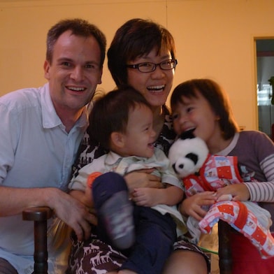 Shell employee Joyce Loh with her husband and two kids.