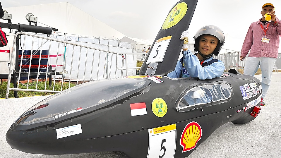 The SI PITUNG, #5, a gasoline prototype vehicle from Batavia Generation Team at the Universitas Negeri Jakarta in Jakarta Timur, Indonesia, gets set to enter the track during day two of the Shell Eco-marathon Asia, in Manila, Philippines, Friday, March 4, 2016.