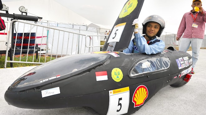 The SI PITUNG, #5, a gasoline prototype vehicle from Batavia Generation Team at the Universitas Negeri Jakarta in Jakarta Timur, Indonesia, gets set to enter the track during day two of the Shell Eco-marathon Asia, in Manila, Philippines, Friday, March 4, 2016.