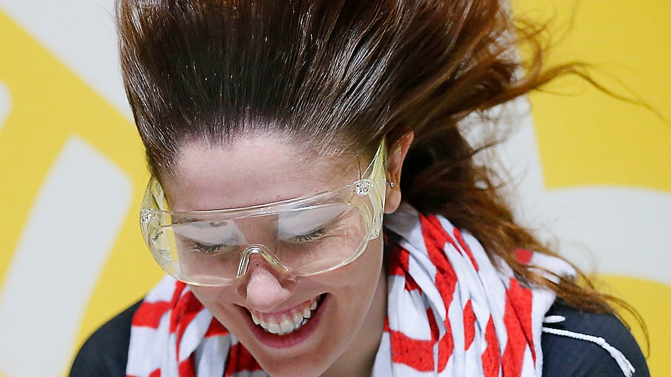 A participant interacts with an exhibit in the Fan Zone on day one of the Shell Eco-marathon Americas 2015 in Detroit, Mich., Friday, April 10, 2015.