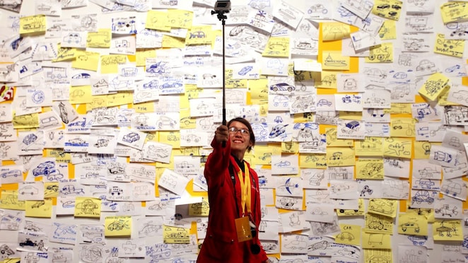 Visitors post 'ideas' on an interactive wall at the 'Experience' during day four of the Shell Eco-marathon in Manila, Philippines, Sunday, March 1, 2015.