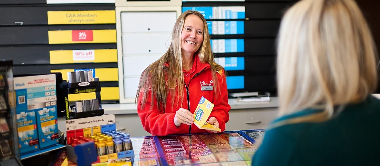 Shell employee chatting with customer