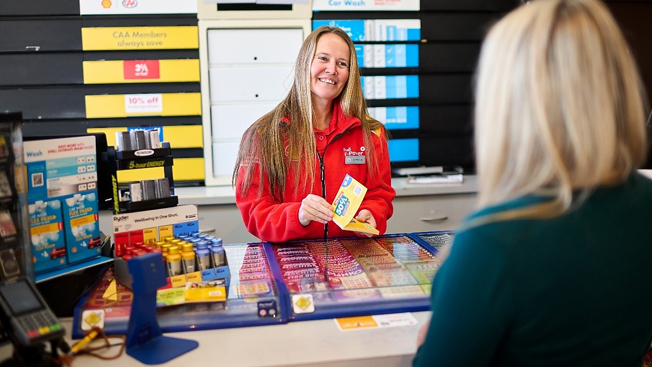 Shell employee chatting with customer