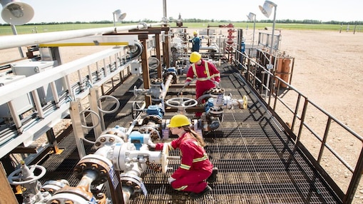 shell engineers working in factory