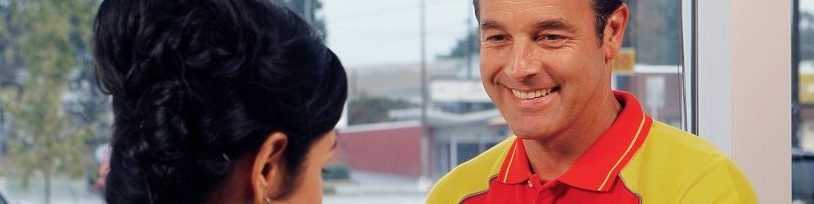 shell retail employee with customer