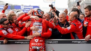 The Ducati team celebrates Danilo's podium in France