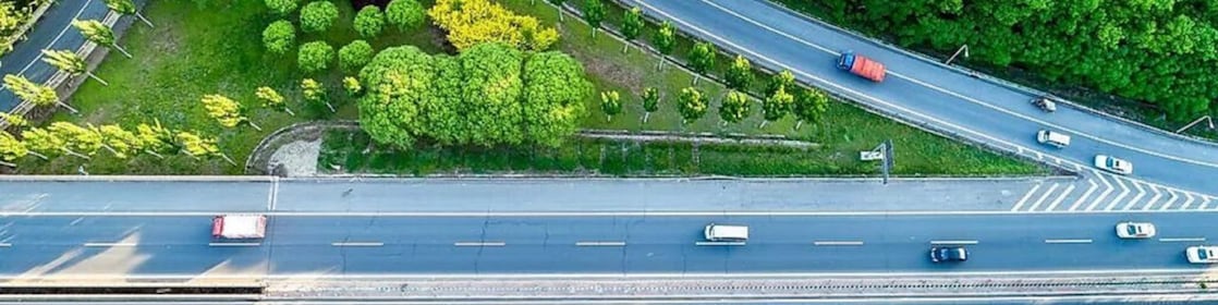 Car driving on highway fueled by Shell Hydrogen fuel