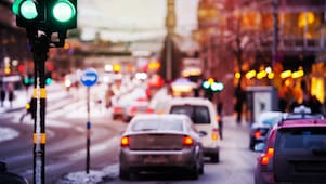 Snow and rain in the evening traffic