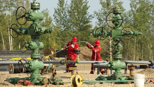 Shell employee working on machine