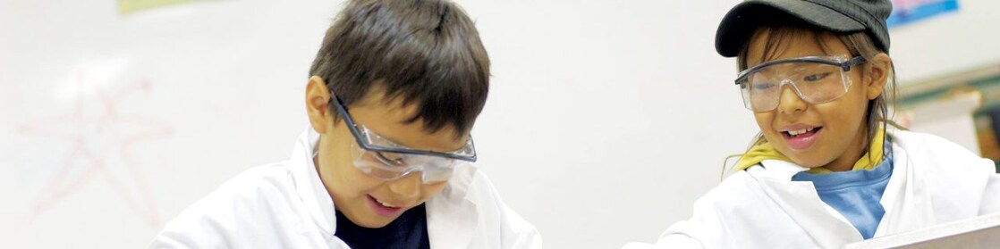Two students in science class