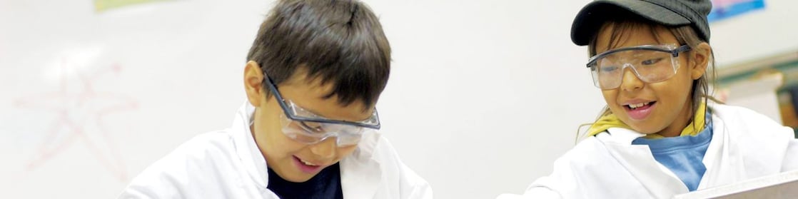 Two students in science class