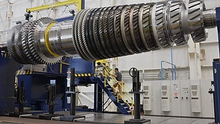 Turbine image with person in background