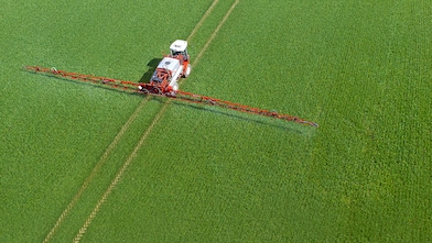 Harvester in field