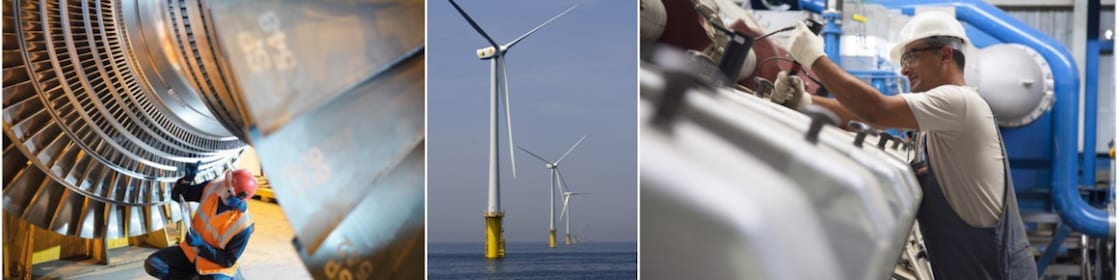 two men working and windmill in center