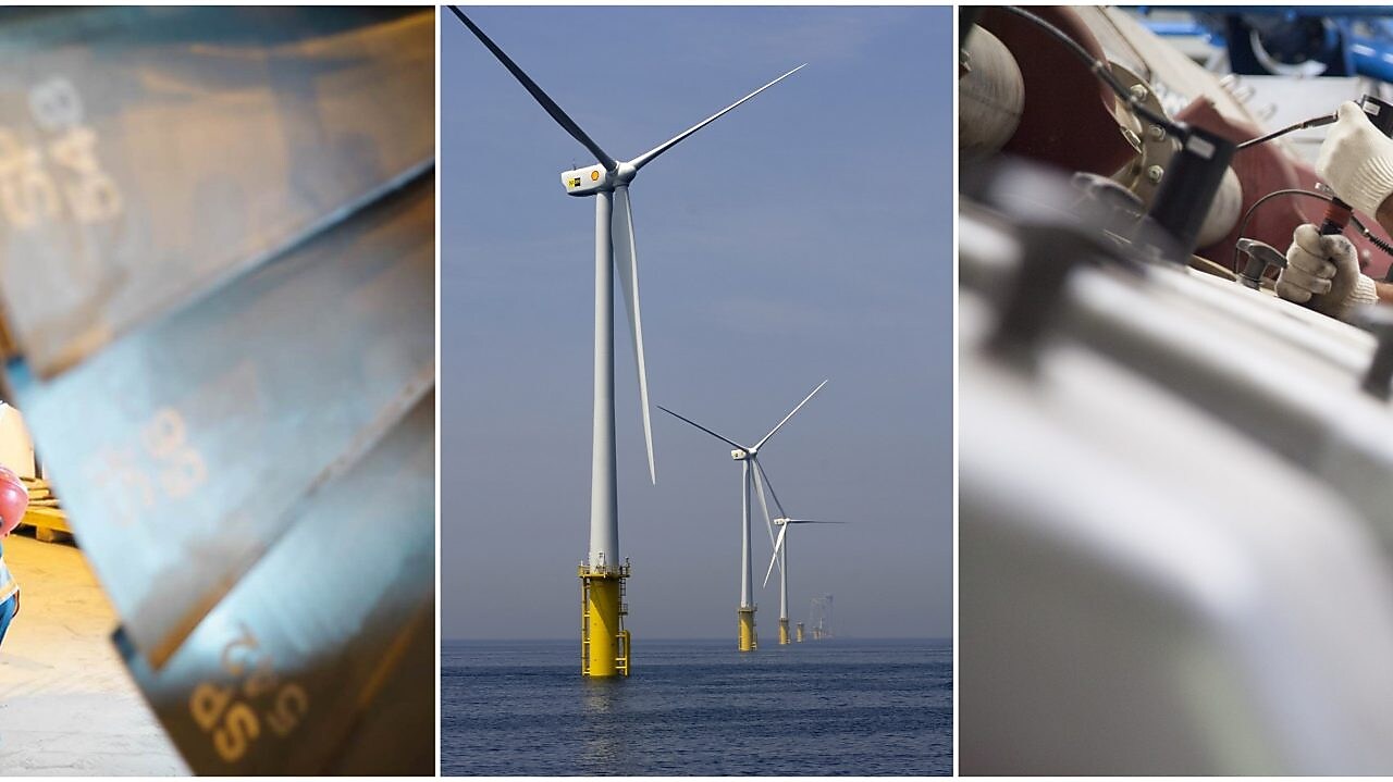 two men working and windmill in center