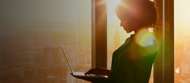 Woman holding a laptop