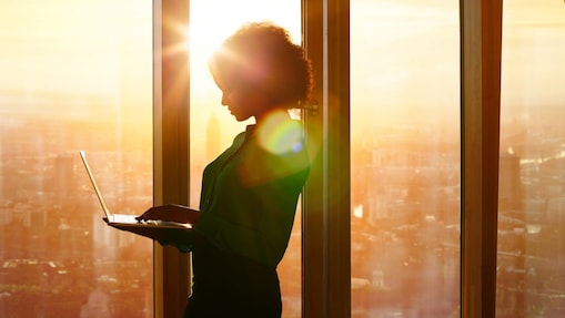 Woman holding a laptop