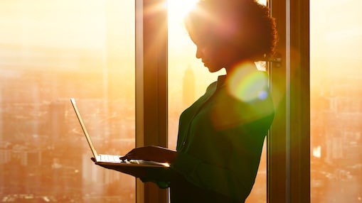 Woman holding a laptop