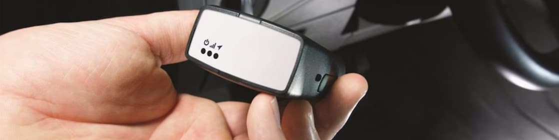 Person holding a Telematics device