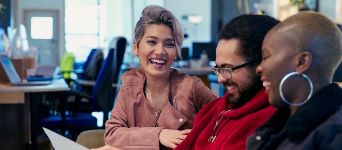 employees posing for a photo