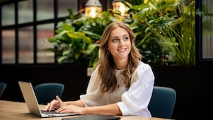 employee working on her laptop