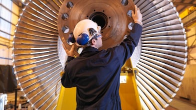 Engineer Inspecting Turbine