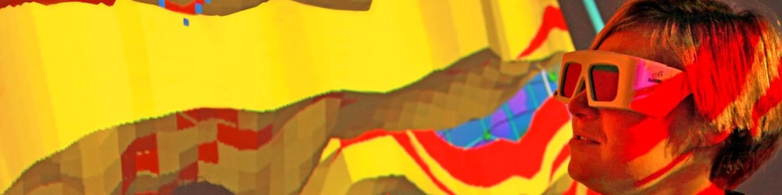 lady wtaching screen with 3d glasses