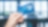 Main portant une carte Airmiles