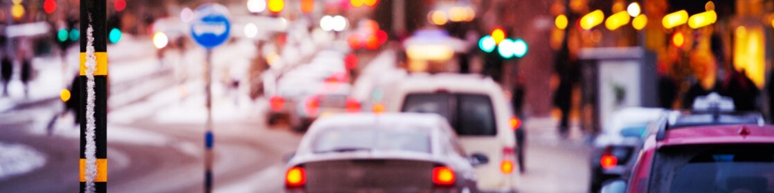 Snow and rain in the evening traffic